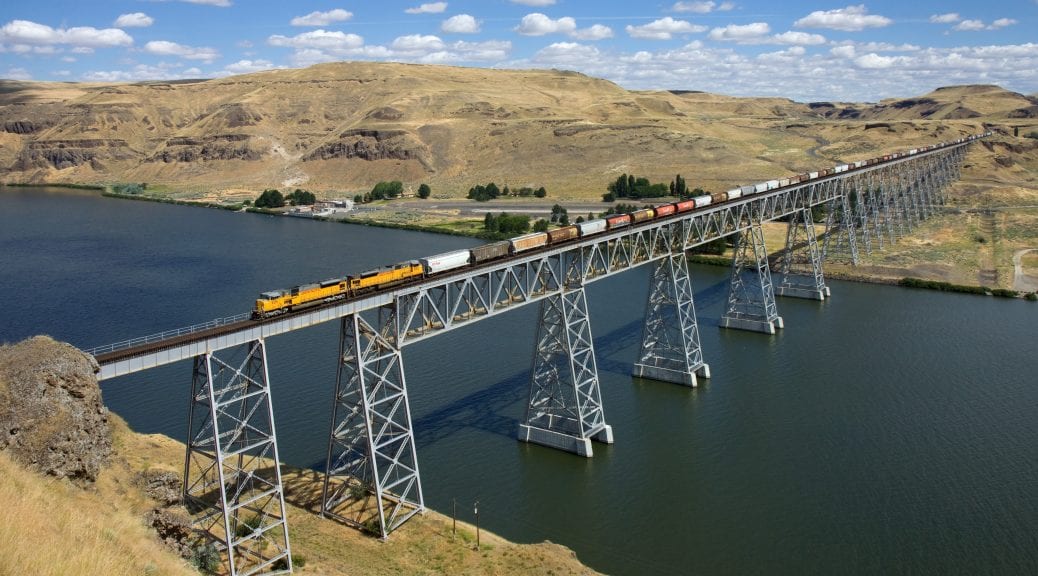 train on a bridge over a river