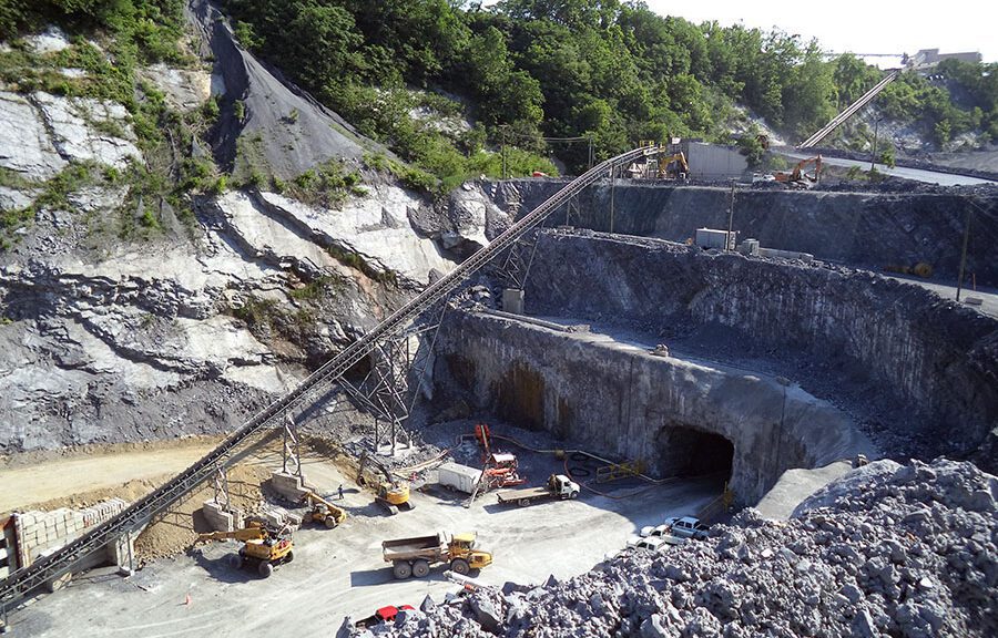 A mining site with aggregate processing equipment set up.